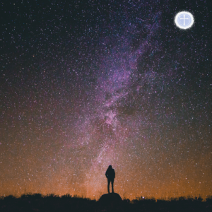 person looking at starry sky