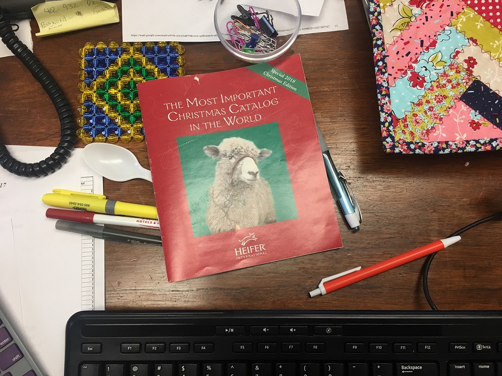 image of desk with heifer international catalog