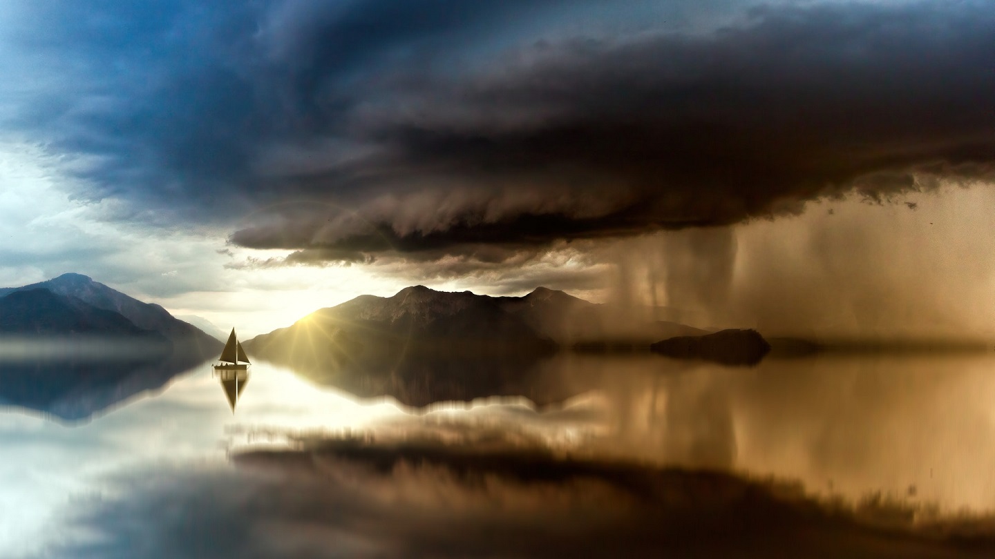 photo of boat at sea