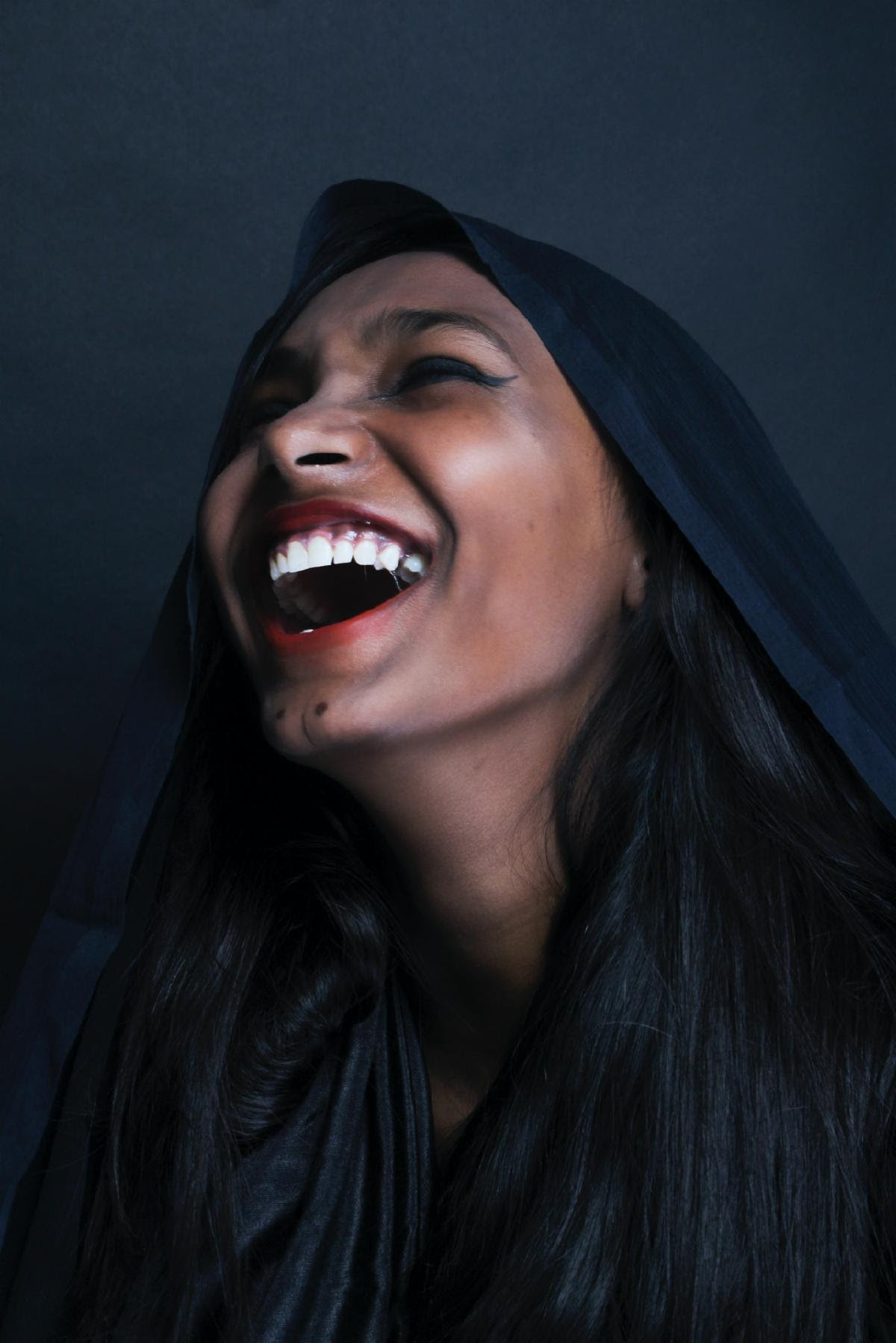 photo of woman laughing